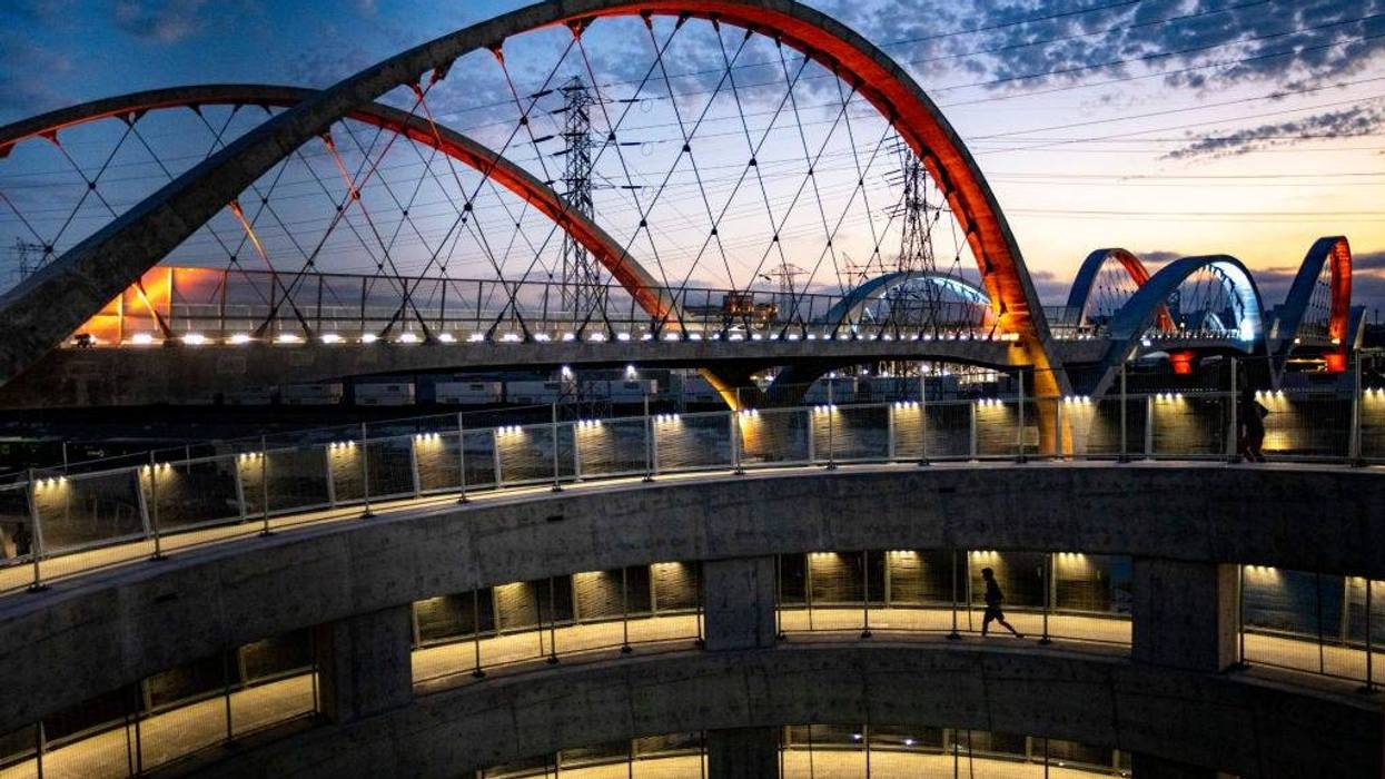 A new $588 million bridge hailed as a colorful beacon of hope for downtown Los Angeles was closed for the fourth night in five as police battled vandalism and dangerous street stunts.