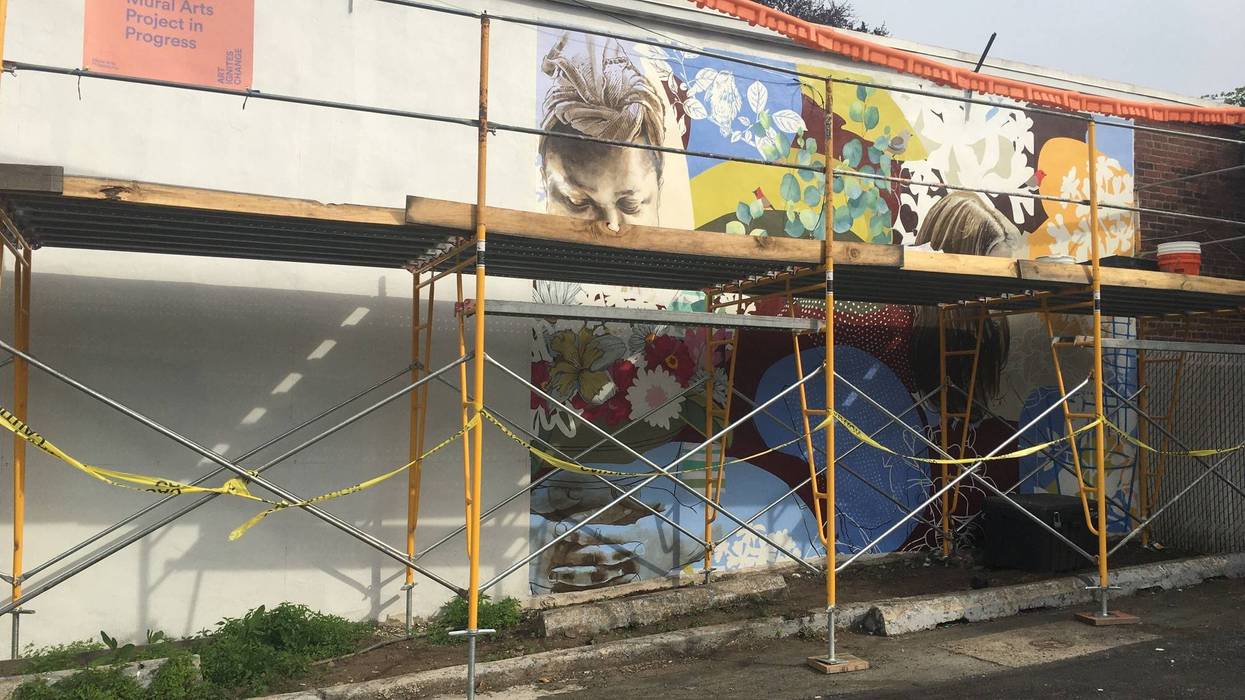 A new mural is in progress in Germantown, at the corner of Queen Lane and Greene Street, honoring caregivers and residents at Einstein's Long Term Structured Residence.