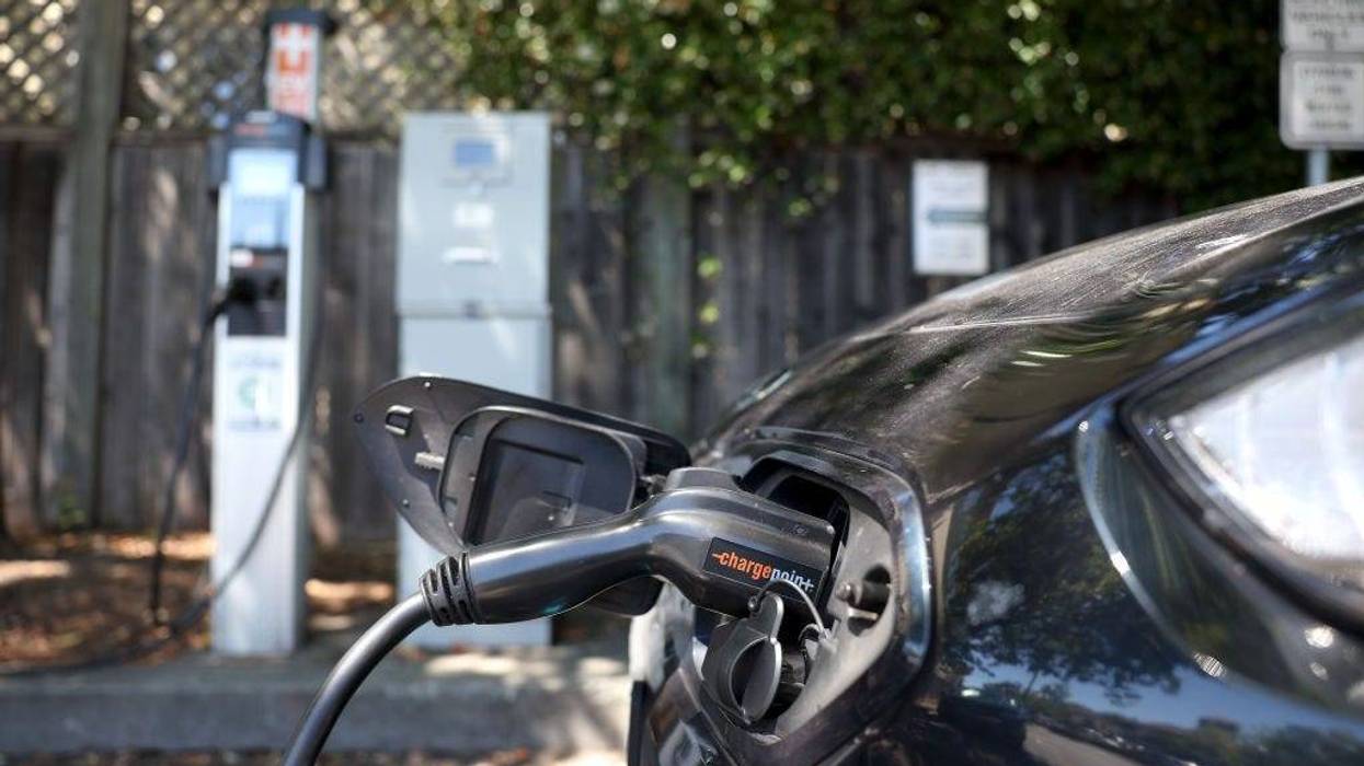 A Nissan electric car sits parked at a Charge Point EV charging station on July 28, 2023 in San Anselmo, California. Seven major automakers announced plans earlier this week to increase the number of high-powered electric vehicle chargers in the country with 30,000 new charging stations along highways and in urban areas. According to the Energy Department, there are currently an estimated 32,000 chargers across the country. (Photo by Justin Sullivan/Getty Images)
