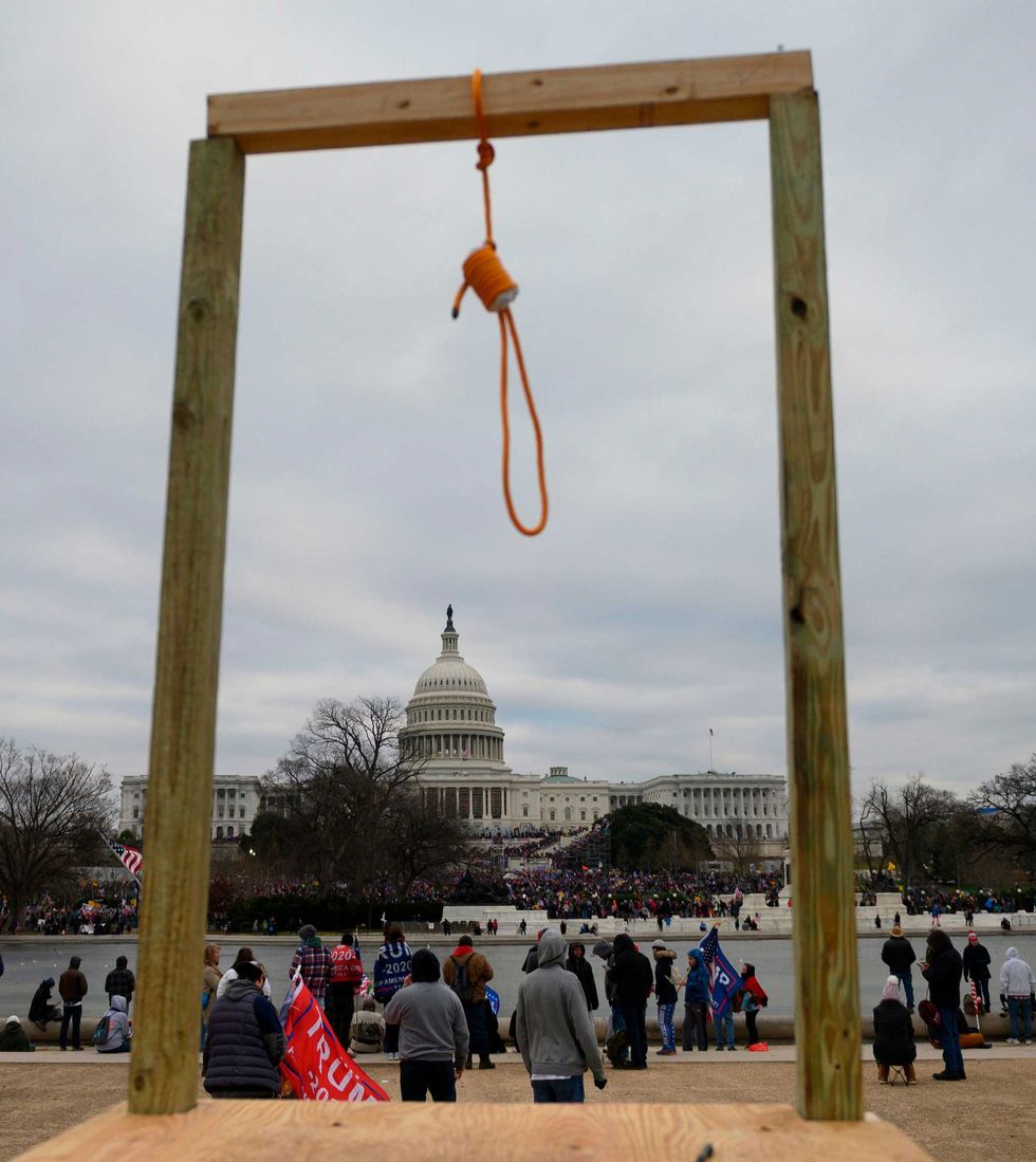A noose is seen on makeshift gallows as supporters of US President Donald Trump gather on the West side of the US Capitol in Washington DC on January 6, 2021.