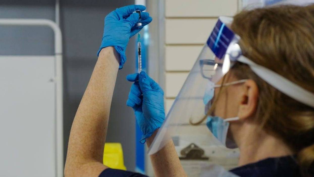 A nurse prepares to administer the Covid-19 vaccine as the Royal Cornwall Hospital begin their vaccination programme on December 9, 2020 in Truro, United Kingdom.