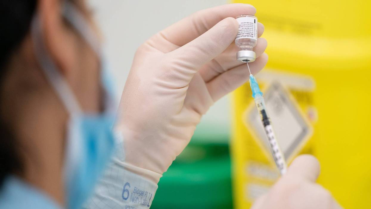A nurse prepares to administer the Pfizer-BioNTech COVID-19 vaccine to patients at Croydon University Hospital, at the start of the largest ever immunisation programme in the UK's history on December 8, 2020 in London, United Kingdom.