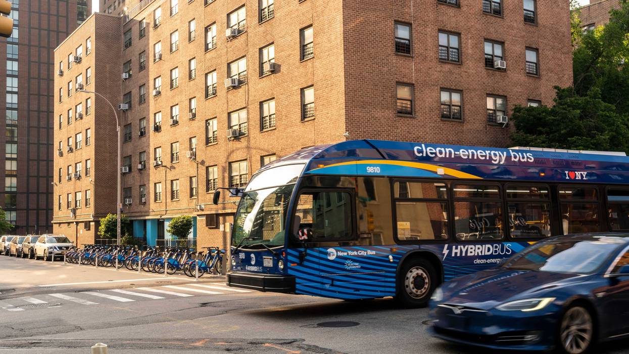 A NYCTA bus passes the NYCHA Fulton Houses complex of apartments in Chelsea in New York on Sunday, May 22, 2022. (ÂPhoto by Richard B. Levine)