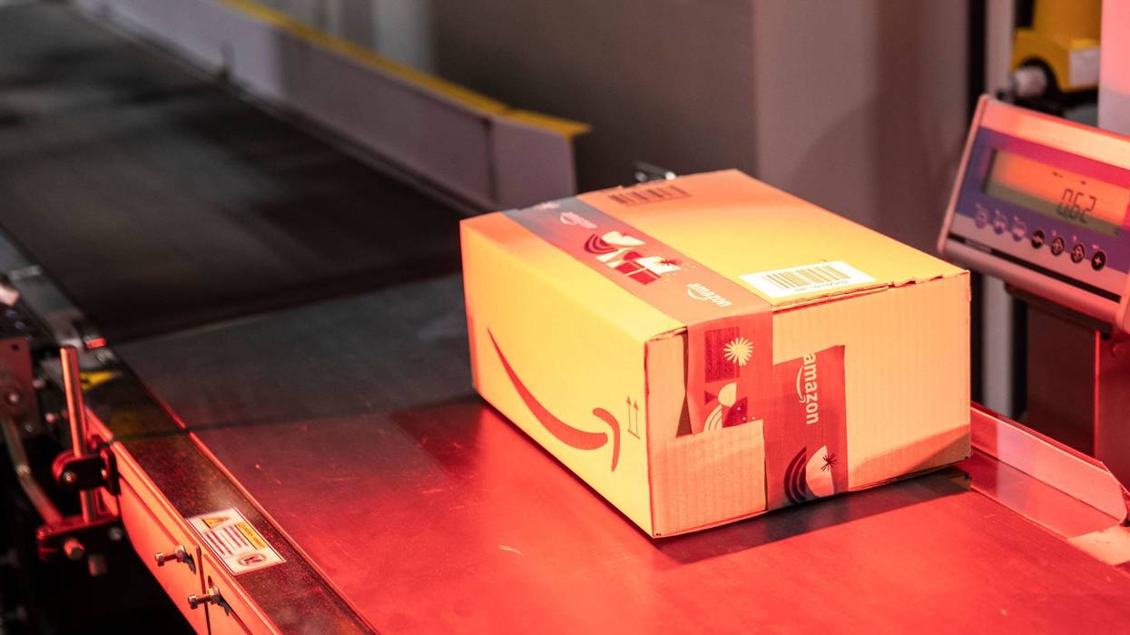 A package is scanned at an Amazon warehouse.