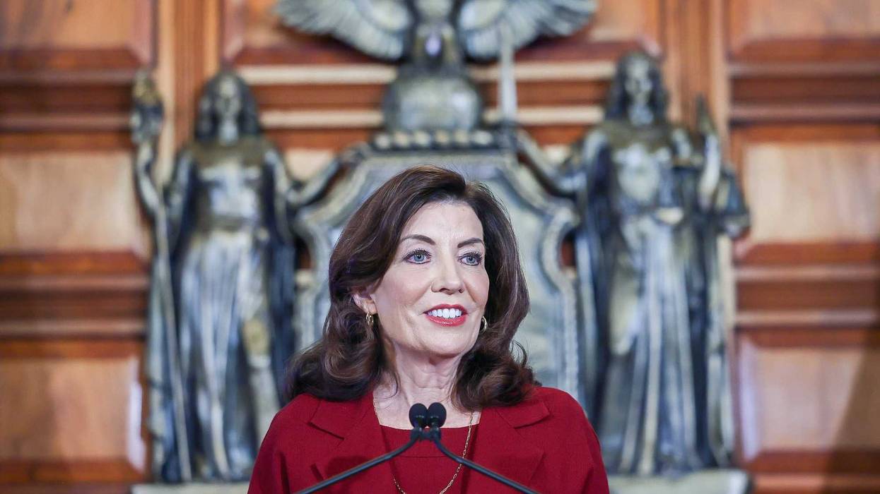 A pair of political pundits peruse the 2024 budget proposal announced by Governor Kathy Hochul Wednesday. They expect a showdown between Hochul and the legislature on some items.