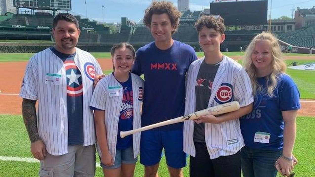 A Park Ridge cancer survivor and young baseball star spent the morning at Wrigley Field hanging out with his favorite player.