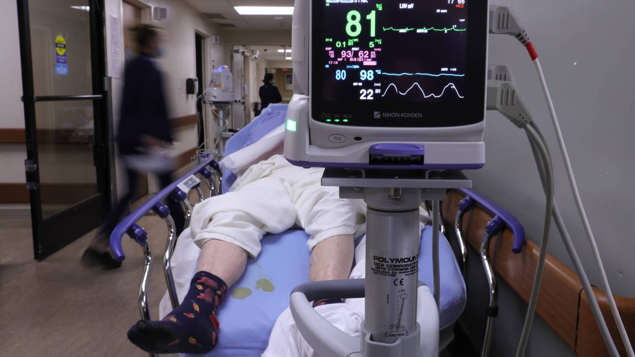 A patient on a stretcher inside a Southern California emergency room.
