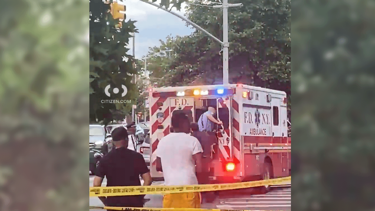 A patient was loaded into an ambulance after the shooting in East Flatbush shortly before 7 p.m. Monday