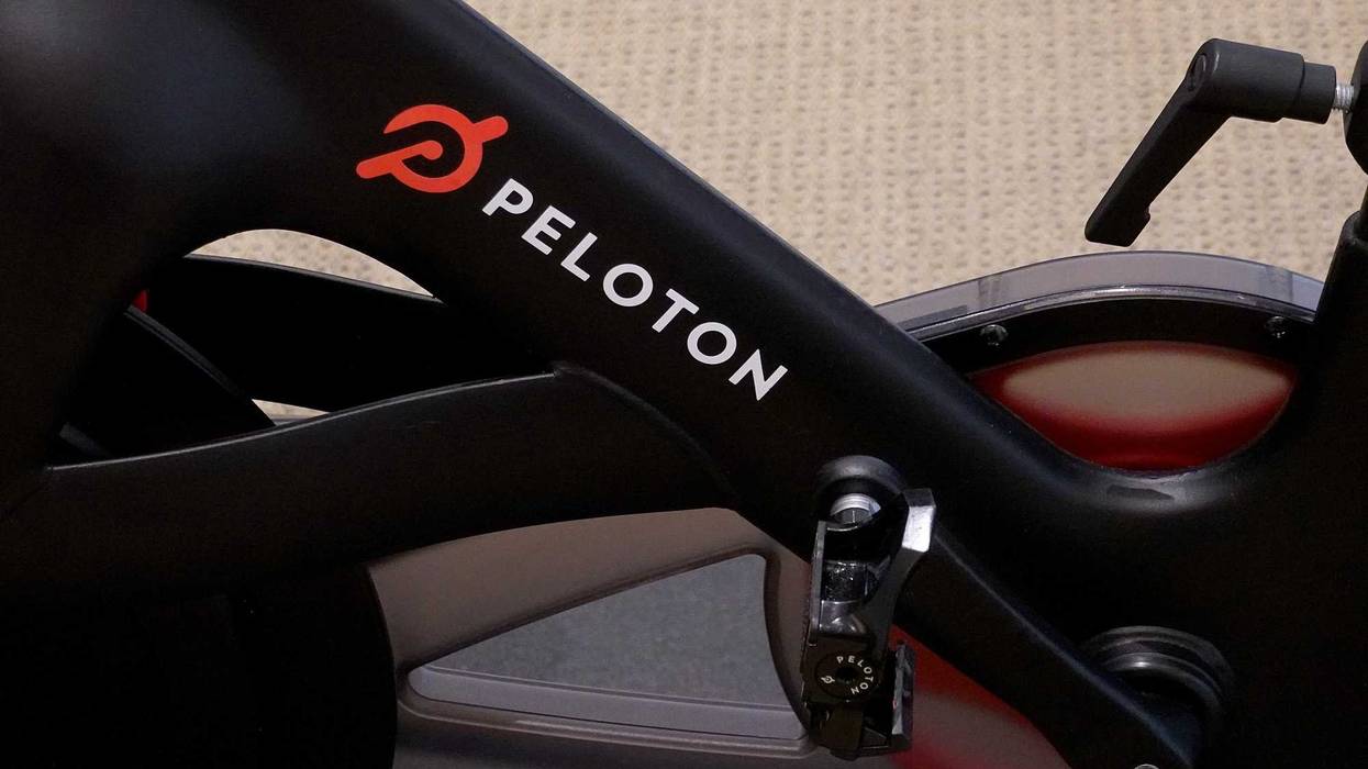 A Peloton bike on the showroom floor on January 20, 2022 in Coral Gables, Florida. Reports indicate that Peloton Interactive Inc is temporarily halting production of its bikes and treadmills after a drop in demand for the products.