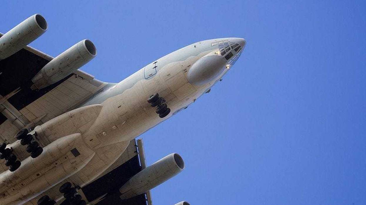 A People's Liberation Army Air Force Illyushin Il-76 on final approach to Perth International airport having just completed a search mission trying to locate missing Malaysia Airways Flight MH370 on April 16, 2014 in Perth, Australia. Twenty-six nations have been involved in the search for Malaysia Airlines Flight MH370 since it disappeared more than a month ago. The Malaysian Airways aircraft went missing on 8th March 2014 whilst on a flight between Kuala Lumpur and Beijing. (Photo by Richard Wainwright - Pool/Getty Images)