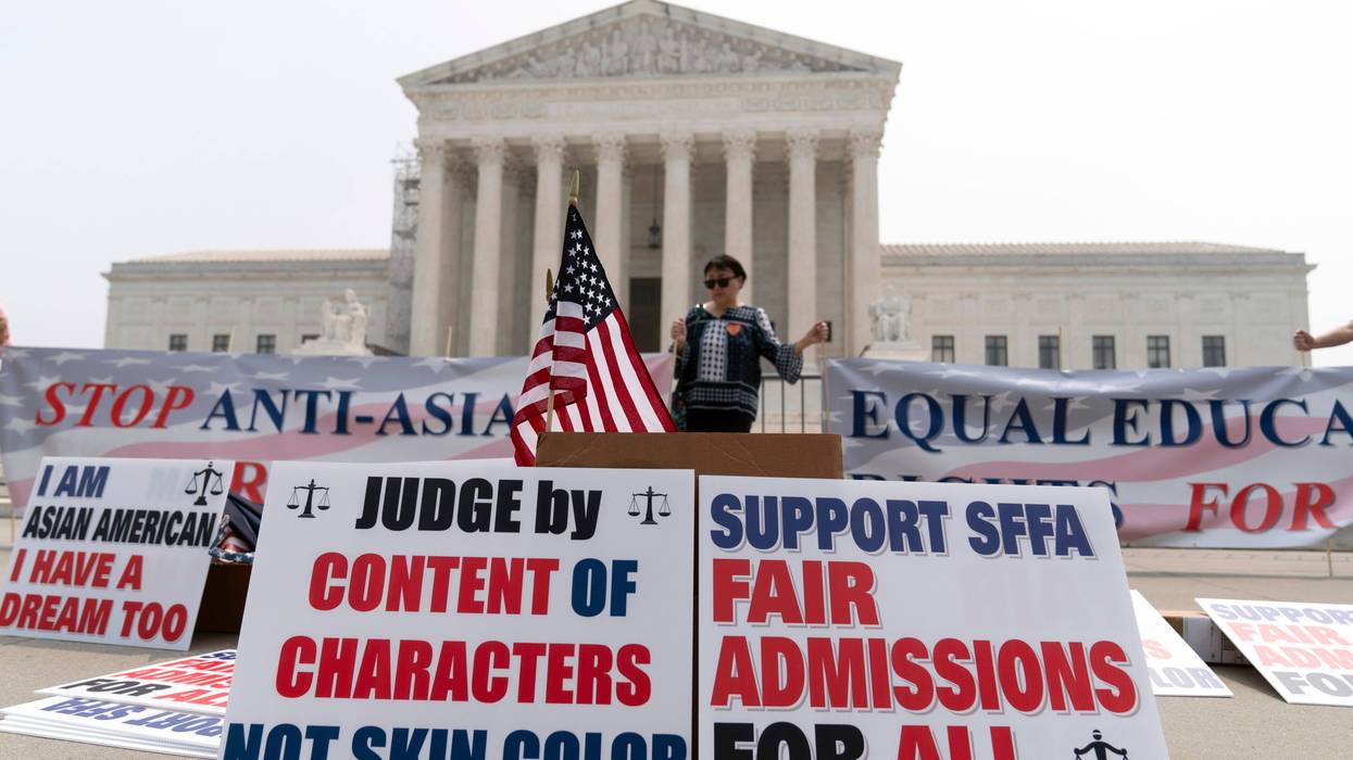 A person protests outside of the Supreme Court in Washington, June 29, 2023. The Supreme Court struck down affirmative action in college admissions, declaring race cannot be a factor and forcing institutions of higher education to look for new ways to achieve diverse student bodies.