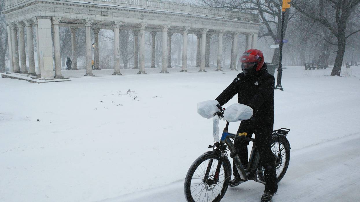 A person rides an e-bike.