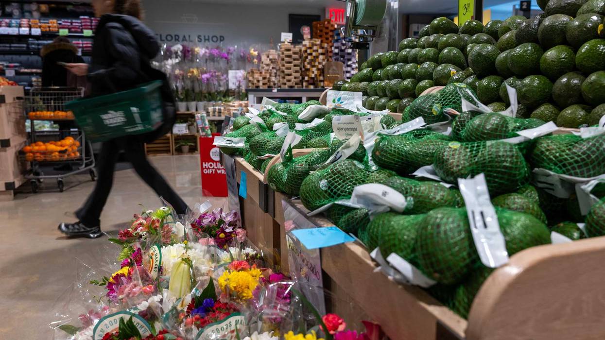 A person shops at a Whole Foods Market grocery store in New York City.