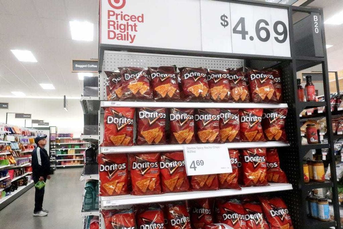 A person shops near a display of Doritos in a Target store on February 13, 2023 in Los Angeles, California.