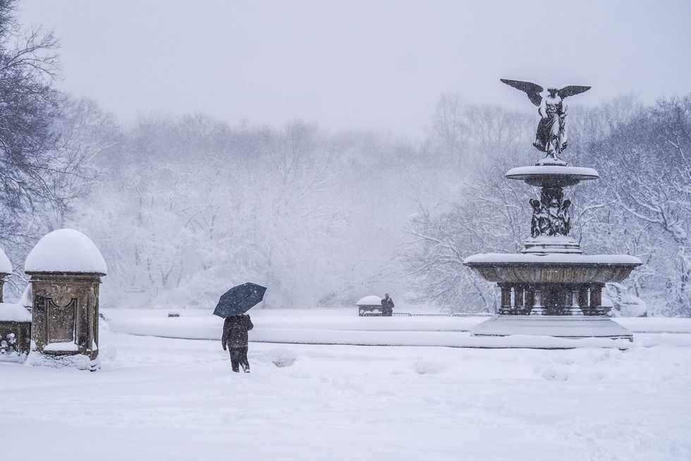 A person ventures into Central Park during the blizzard on Monday morning