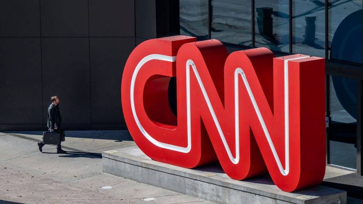 A person walks into the world headquarters for the Cable News Network (CNN) on November 17, 2022 in Atlanta, Georgia.