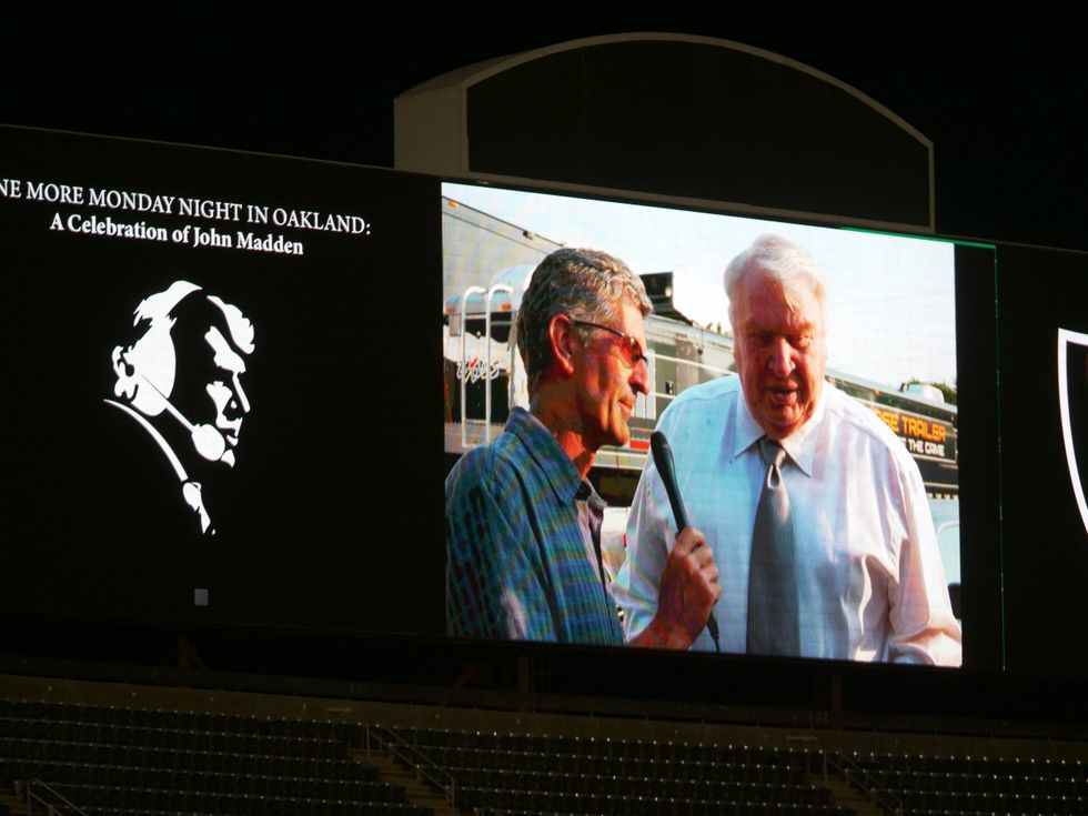 A photo of John Madden and Stan Bunger shown at the memorial.