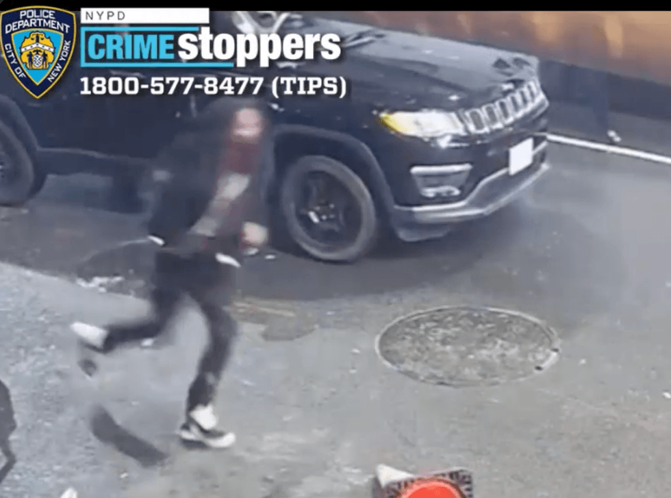 A photo of the suspect at the scene of the shooting