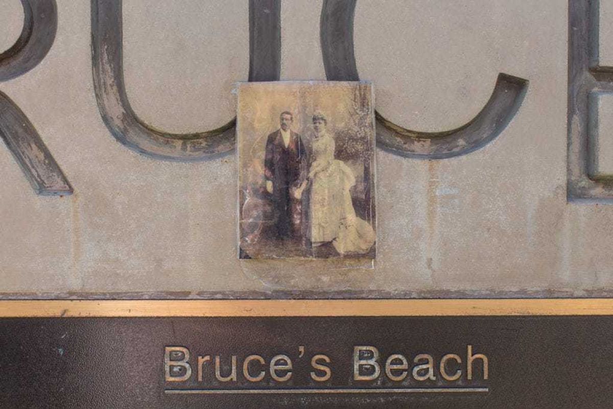 A photo of Willa and Charles Bruce was placed on the plaque at Bruces Beach in Manhattan Beach, California.