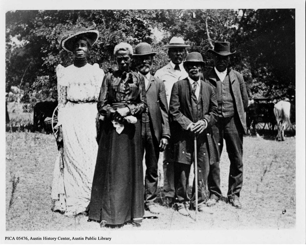 A picture of an Emancipation Day celebration on June 19, 1900, held in the "East Woods" in Austin, Texas
