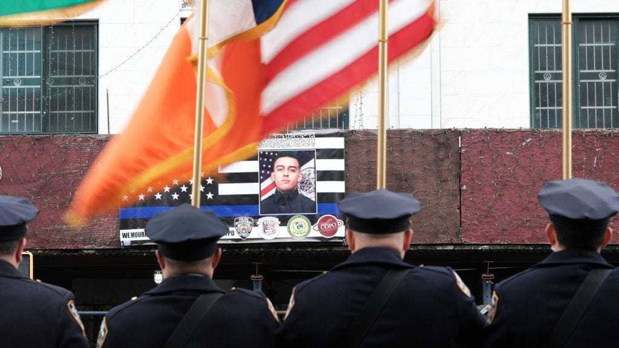 A picture of fallen NYPD police officer Adeed Fayaz is displayed outside of a mosque on Coney Island Avenue during his funeral on February 09, 2023 in the Brooklyn borough of New York City.