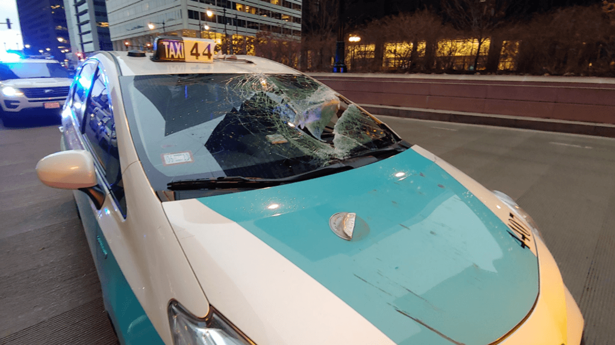 A piece of falling wood injured a driver Wednesday morning near Willis Tower amid a high wind warning in the Chicago area.