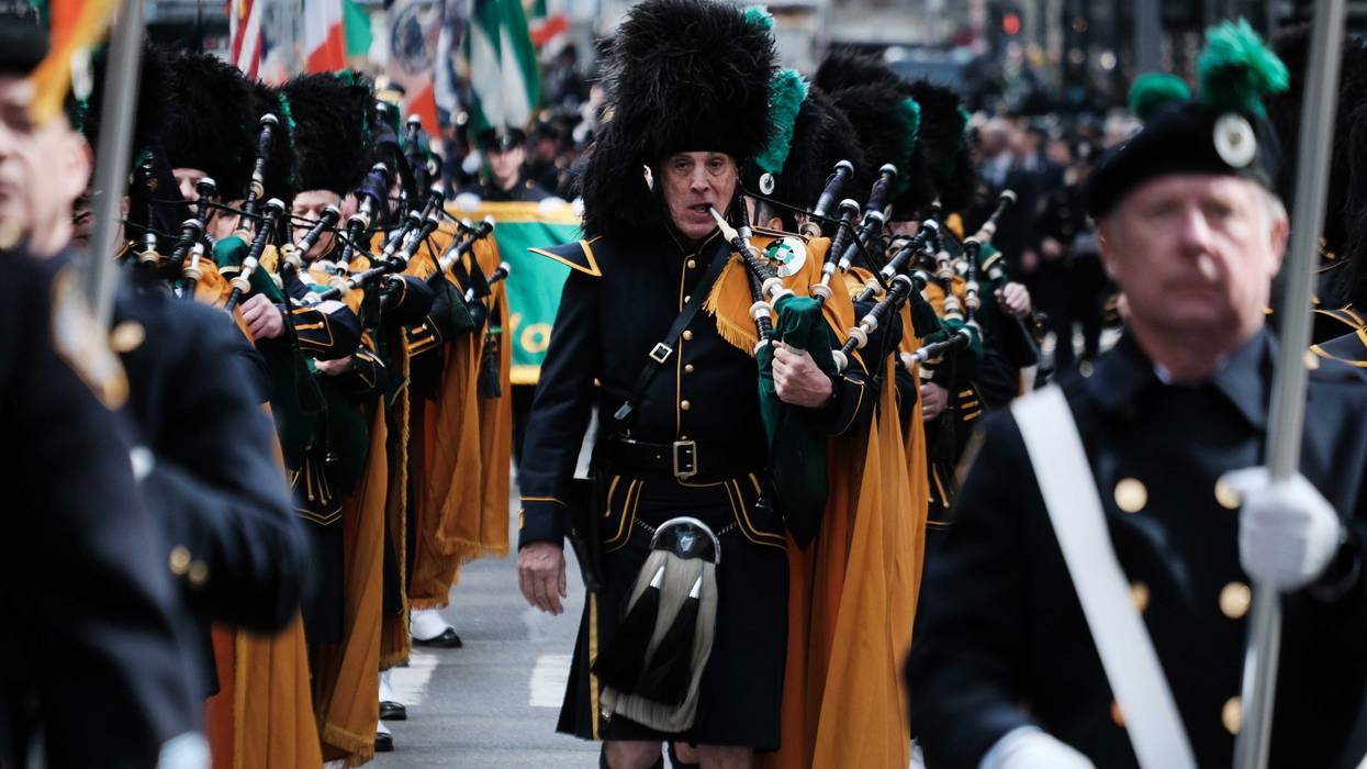 A police department Pipe and Drums band marches in the St. Patrick's Day Parade along Fifth Avenue on March 17, 2023