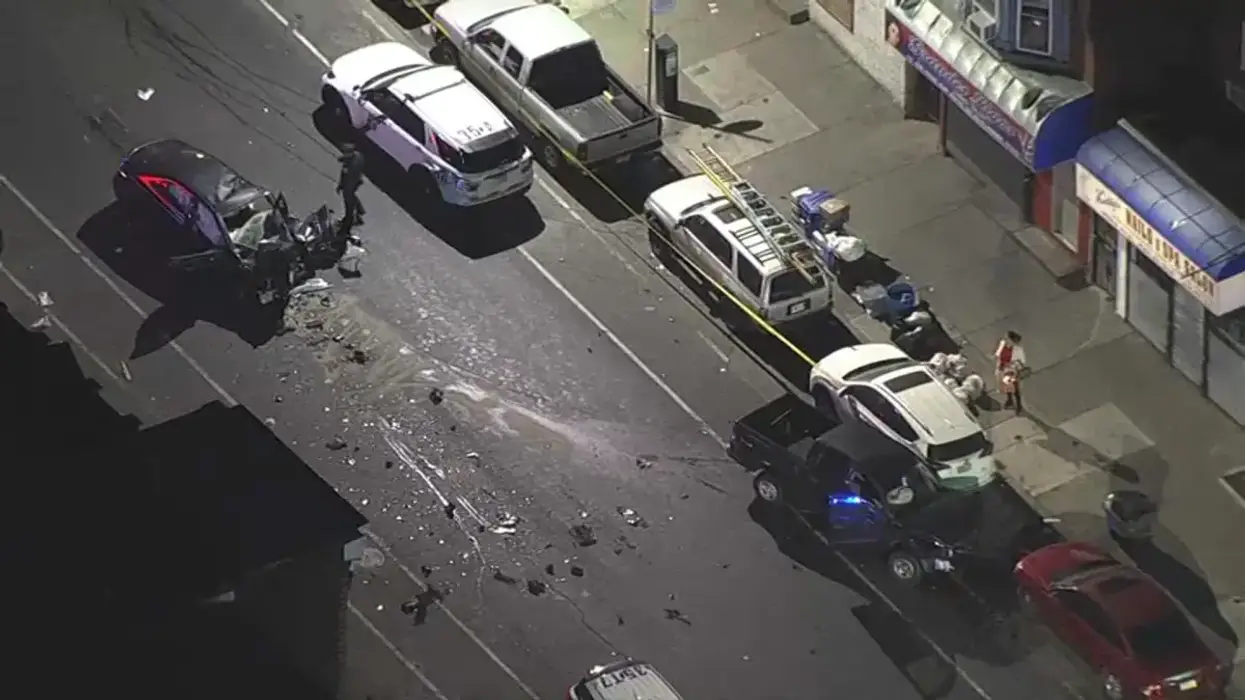 A police officer and three others were injured in a car crash in Olney.