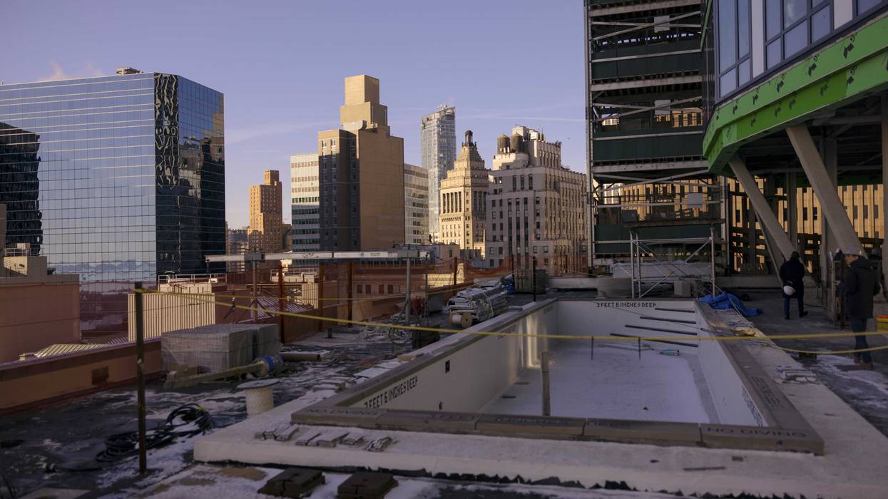 A pool area under construction on the twentieth floor of the SoMA residential tower at 25 Water Street in the Financial District of New York