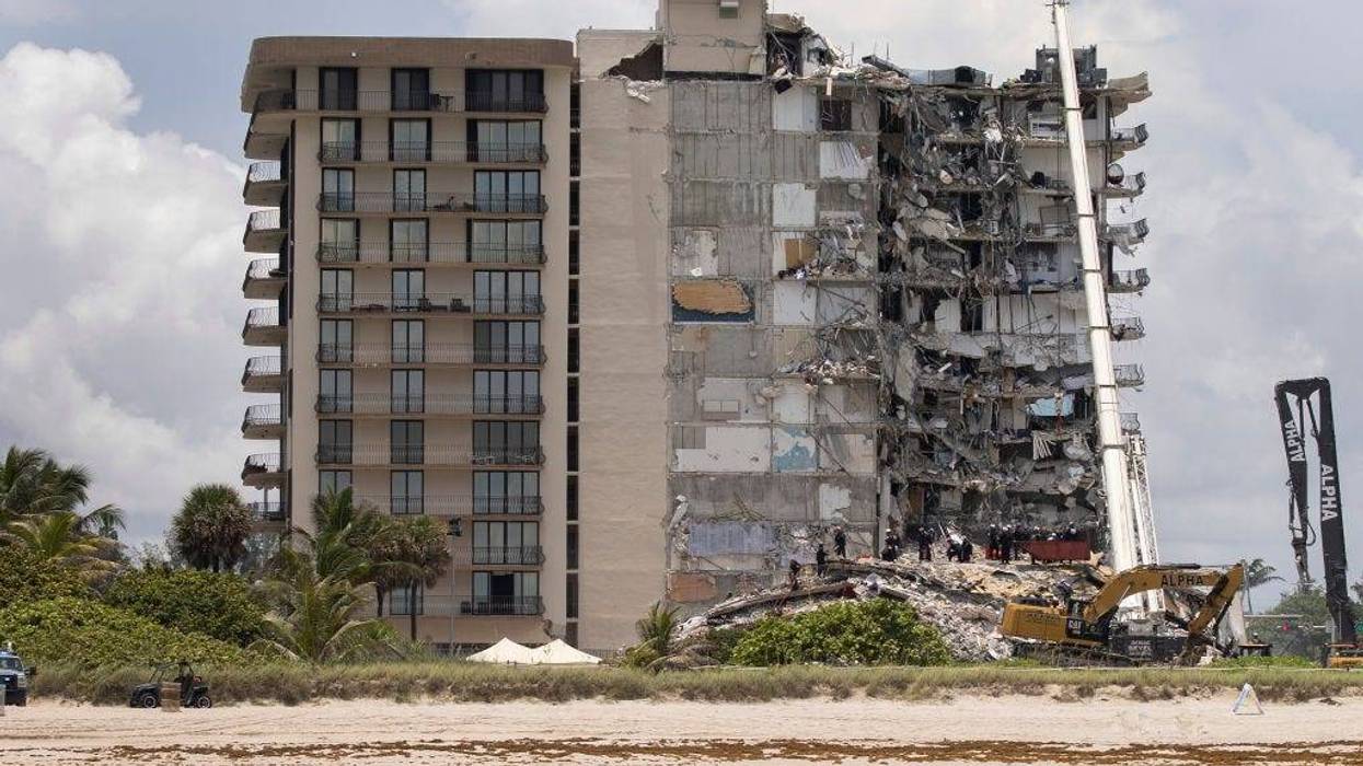 A portion of the 12-story condo tower crumbled to the ground during a partial collapse of the building on June 24, 2021 in Surfside, Florida.