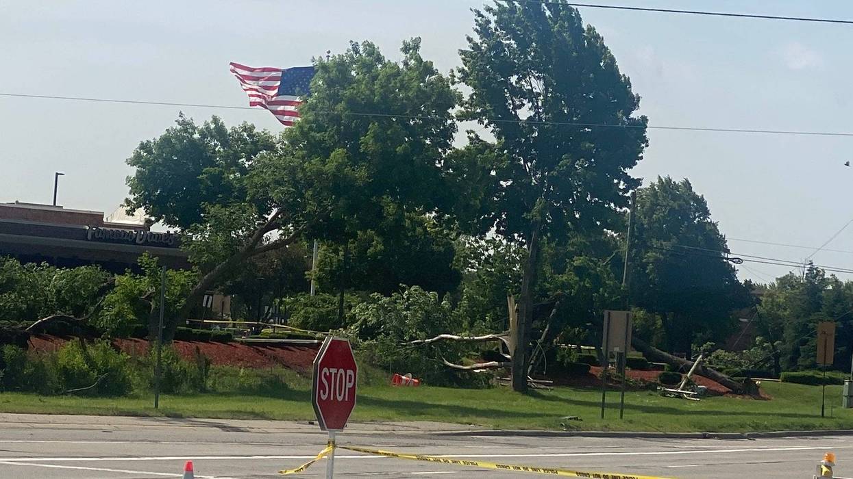 A powerful system of fast-moving storms blew through Metro Detroit Thursday morning, leaving behind thousands without power and debris scattered over roadways.