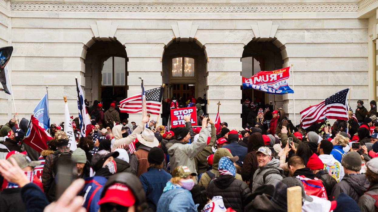A pro-Trump mob floods into the Capitol Building after breaking into it on January 6, 2021 in Washington, DC.