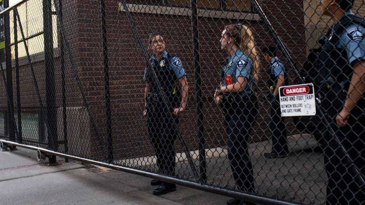 A proposal that would allow the City of Minneapolis to charge fees for off-duty police work is approved by a council committee.