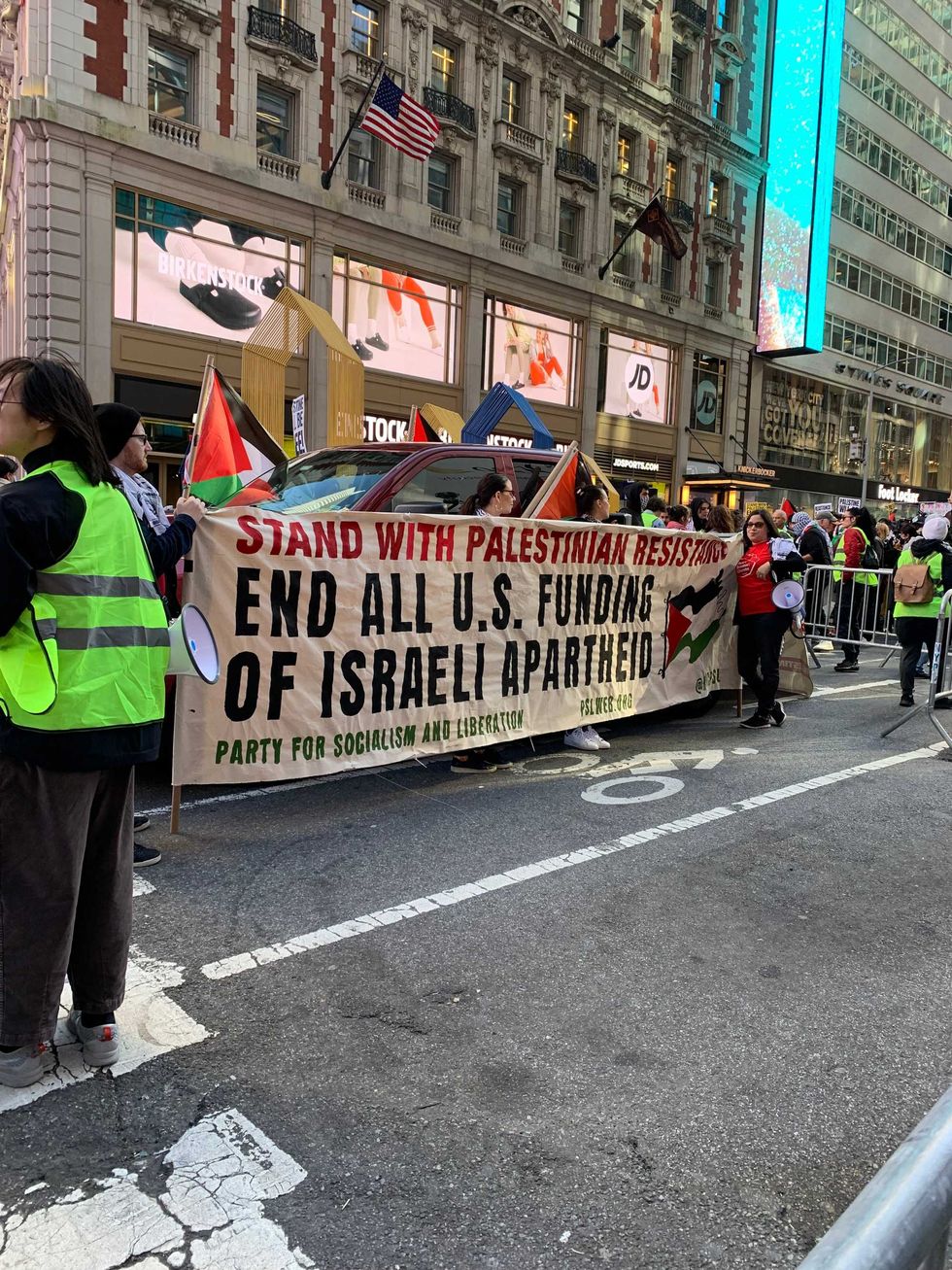 A protest is being held in Times Square as part of the "Day of Protest" in support of Palestinians.