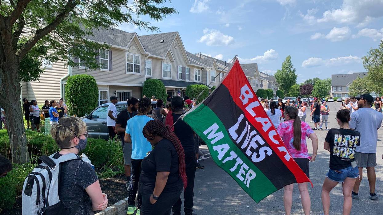 A protest outside the home of a Mount Laurel man who was arrested and charged with race-based harassment and intimidation.