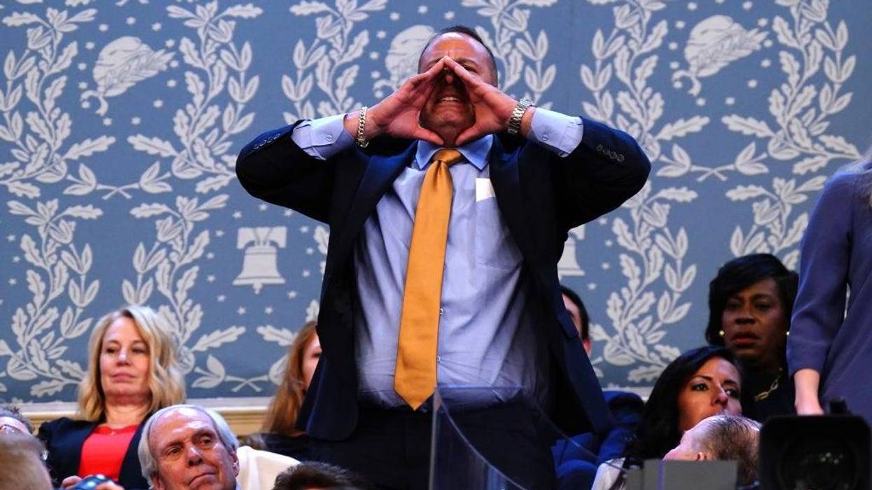 A protester shouts at U.S. President Joe Biden as he delivers the annual State of the Union address before a joint session of Congress in the House chamber at the Capital building on March 7, 2024 in Washington, DC.
