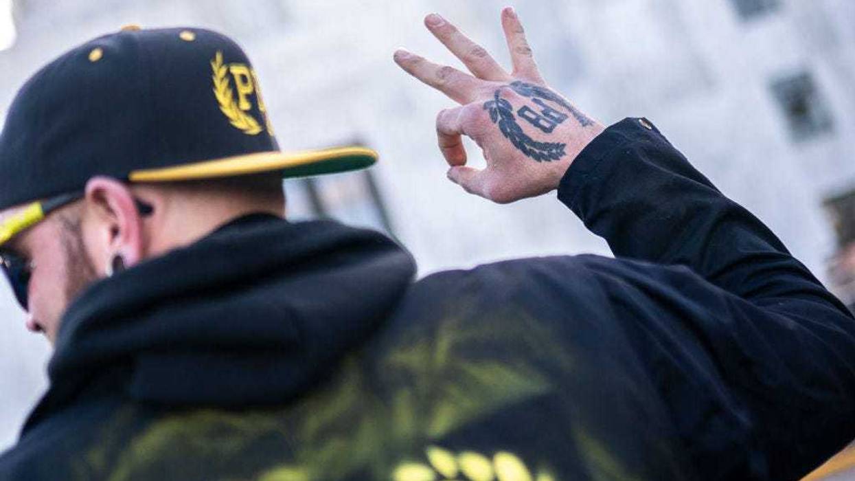 A Proud Boys gestures during a protest in support of the January 6 attack on the U.S. Capitol.