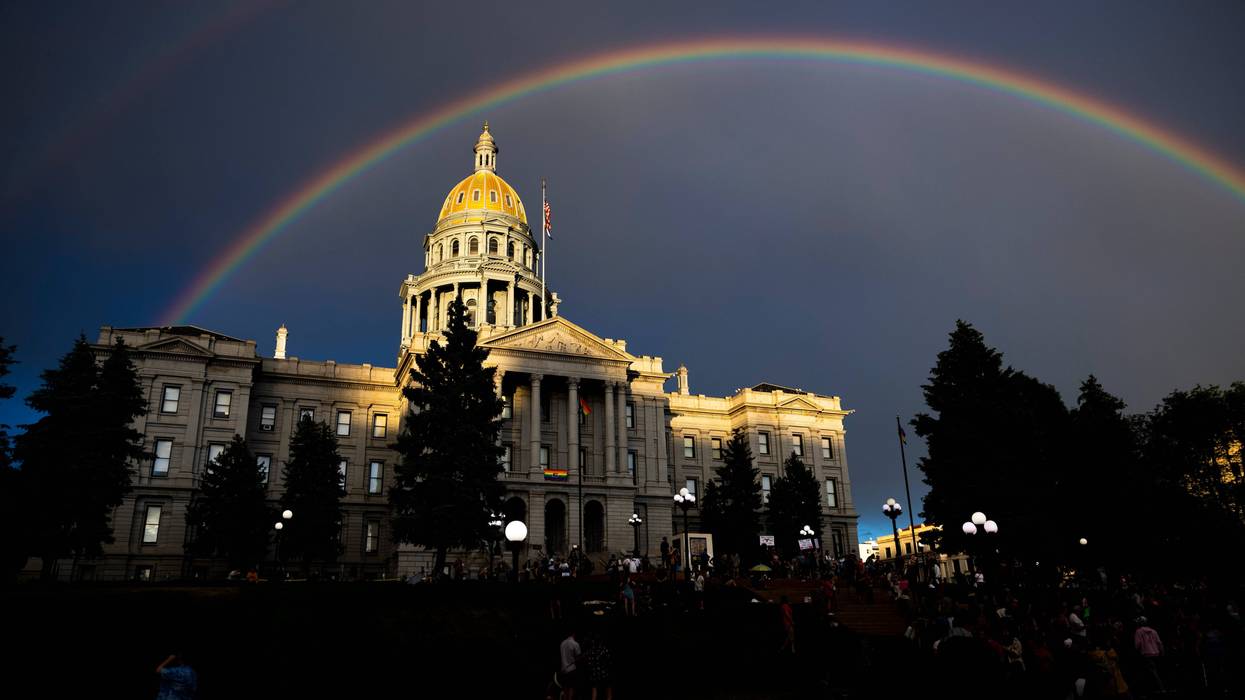 A rainbow forms above the Colorado State Capitol as people gather in protest of the Supreme Court's decision to overturn Roe v. Wade on June 24, 2022, in Denver, Colorado.