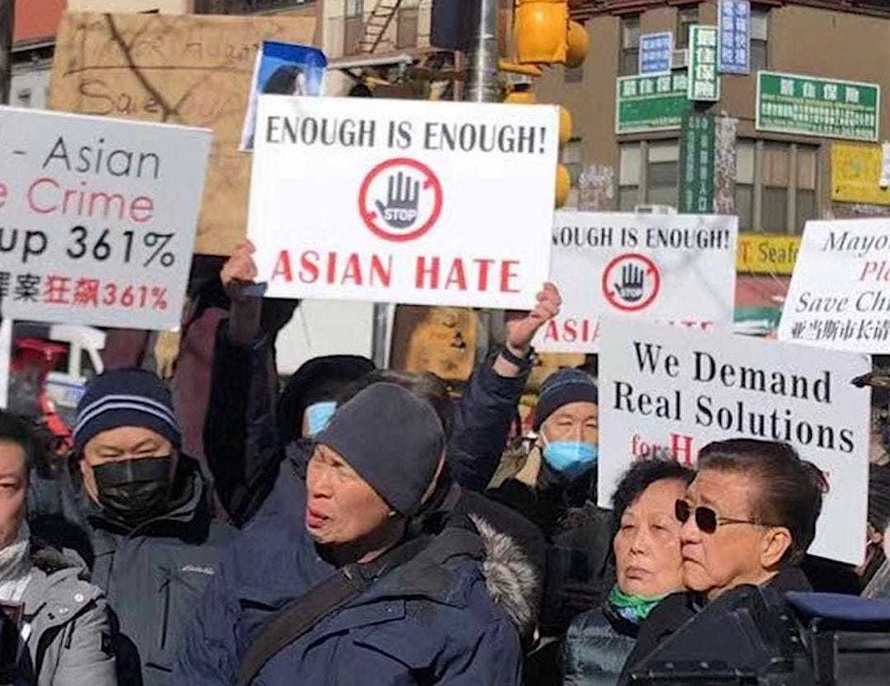 A rally was held across the street from where Christina Yuna Lee, 35, was stabbed to death in her apartment building on Chrystie Street