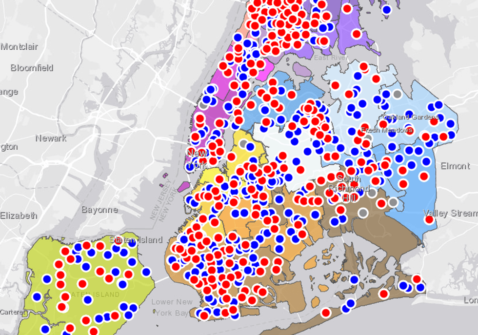 A red dot indicates a building that has been closed, while a blue dot indicates one or more classrooms in a building that has been closed.