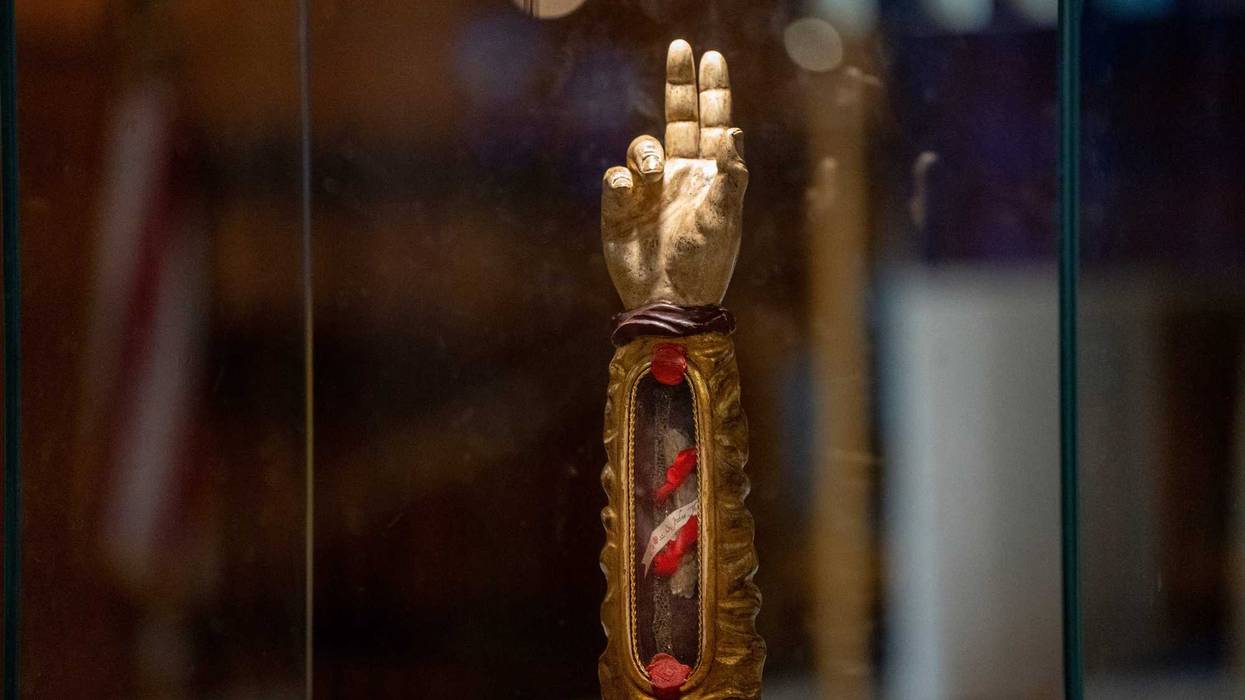 A relic of St. Jude is shown at the Church of the Assumption in Emerson on Thursday, Dec. 7, 2023. The relic allegedly consists of a bone from the arm of St. Jude, known as the patron saint of hopeless causes and the Apostle of the Impossible, and is encased in a wooden vessel shaped like an arm within a glass case.