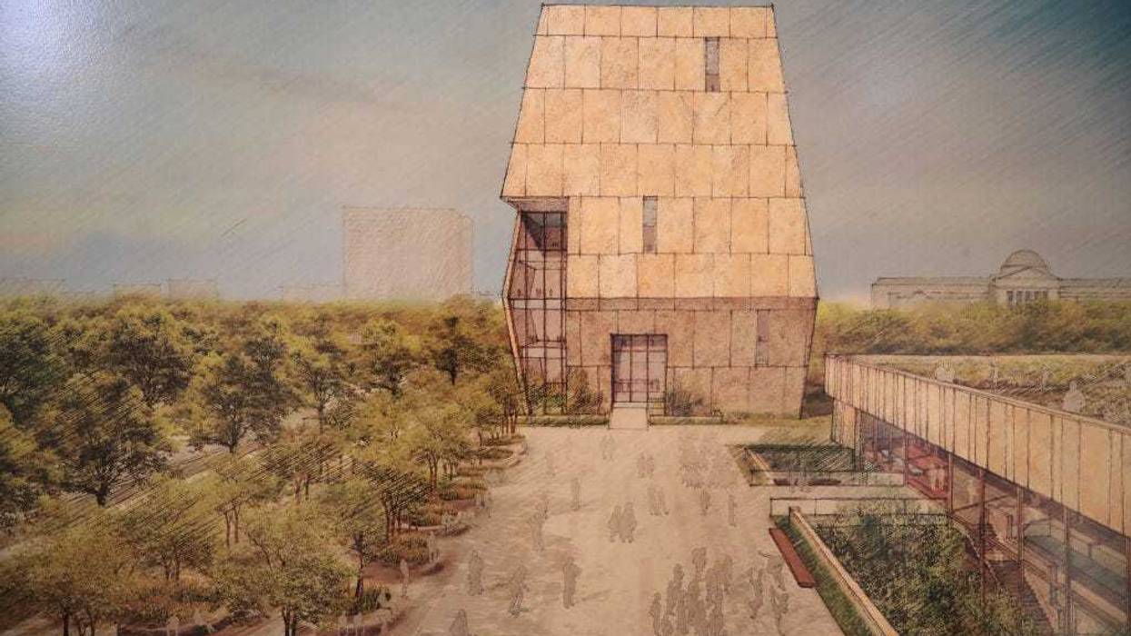 A rendering of the proposed Obama Presidential Center, which is scheduled to be built in nearby Jackson Park, is displayed at the South Shore Cultural Center during a roundtable discussion moderated by former President Barack Obama on May 3, 2017 in Chicago, Illinois. The Presidential Center design envisions three buildings, a museum, library and forum. Obama was accompanied at the event by his wife Michelle who was making her first trip back to Chicago since leaving the White House in January.