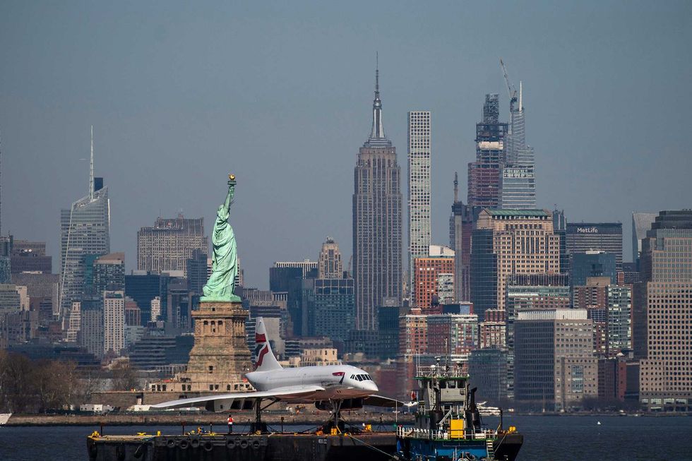 A retired British-Airways Concorde supersonic airliner is moved on a barge up the Hudson River on March 13, 2024