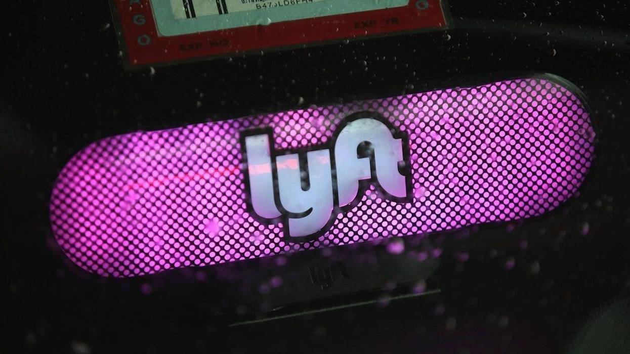 A ride share driver picks up passengers at O'Hare Airport on April 10, 2019 in Chicago, Illinois.