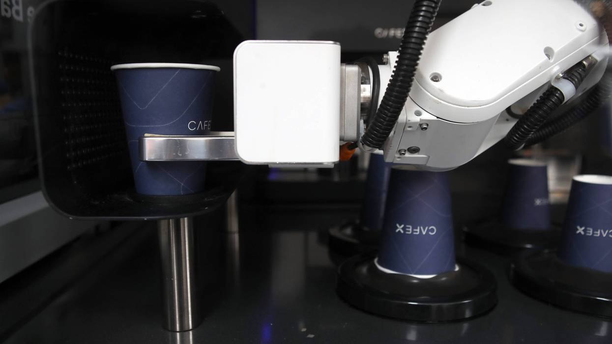 A robotic barista at Cafe X makes coffee drinks on February 12, 2019 in San Francisco, California.