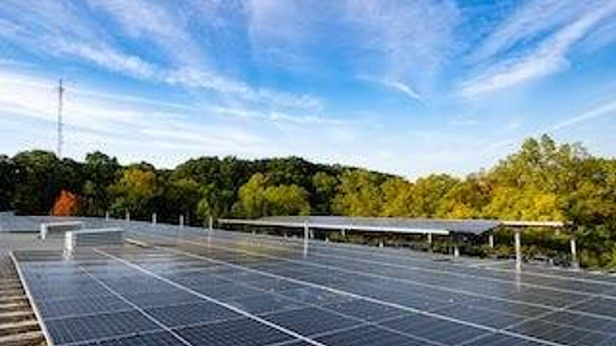 A rooftop filled with solar panels