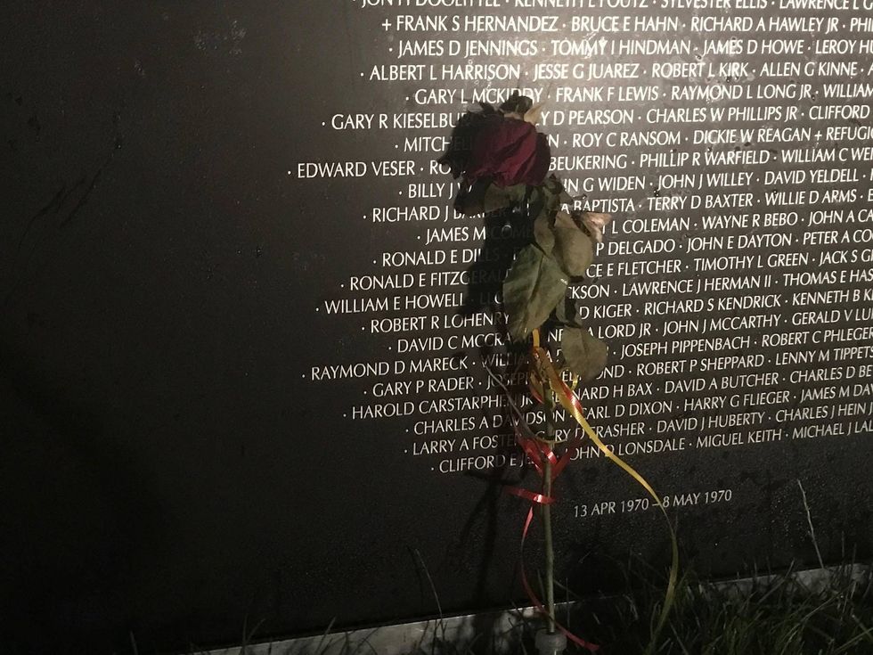 A rose at the Traveling Vietnam Memorial Wall in Pittsburgh