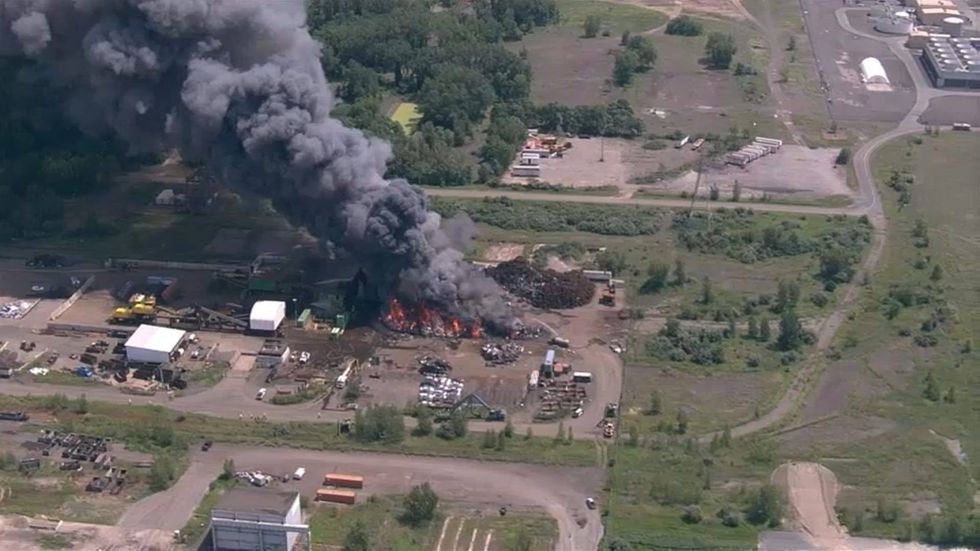 A rubbish fire in the Keystone Industrial Port Complex in Falls Township, Bucks County, sends up plumes of smoke