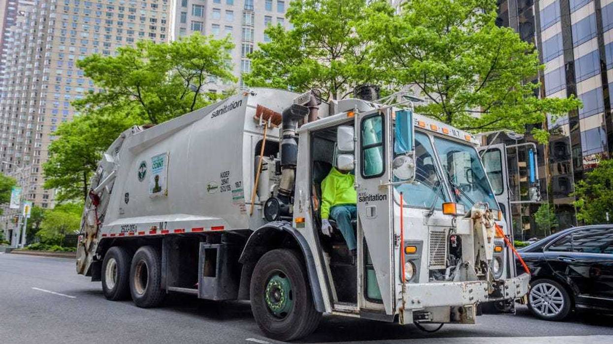 A sanitation truck driving around the streets of Manhattan on May 24, 2020.