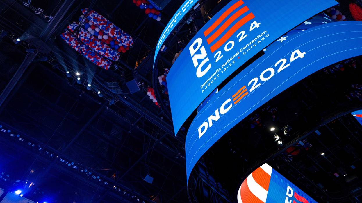 A scoreboard displays "DNC 2024" ahead of the Democratic National Convention at the United Center in Chicago.
